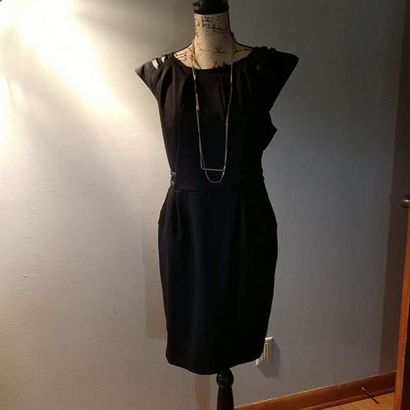 black dress with gold accents